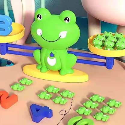 Descubra a Balança Sapo Matemático Montessori, um brinquedo seguro e divertido que ensina matemática às crianças. Perfeito para idades de 3 a 12 anos.